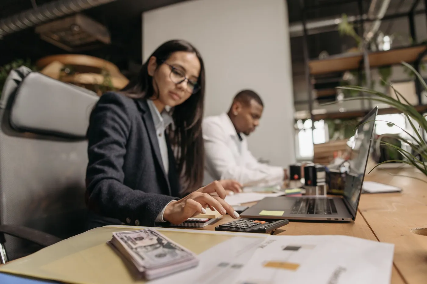 Prime's payroll team reviewing records at their desks